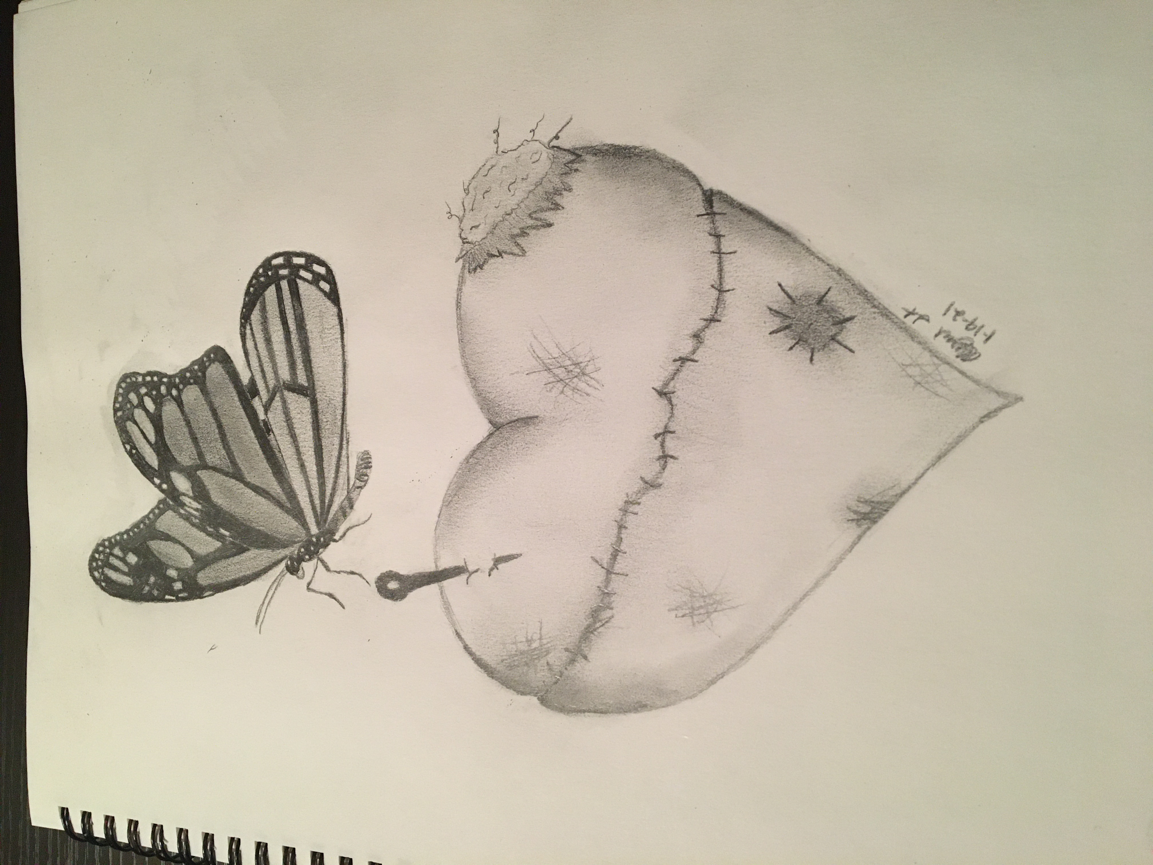 Pencil drawing of a mended heart with a butterfly