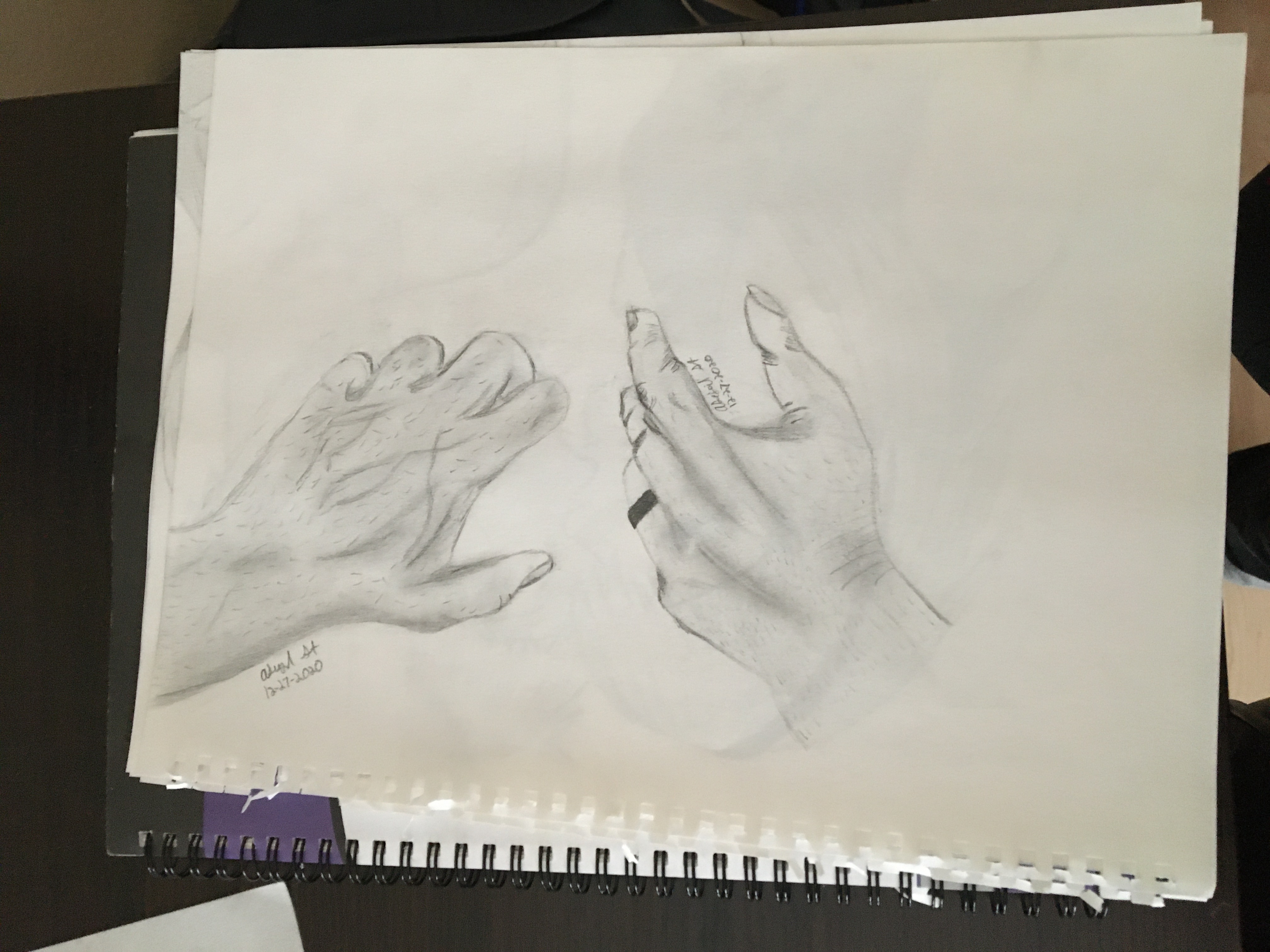 Pencil drawing of two hands